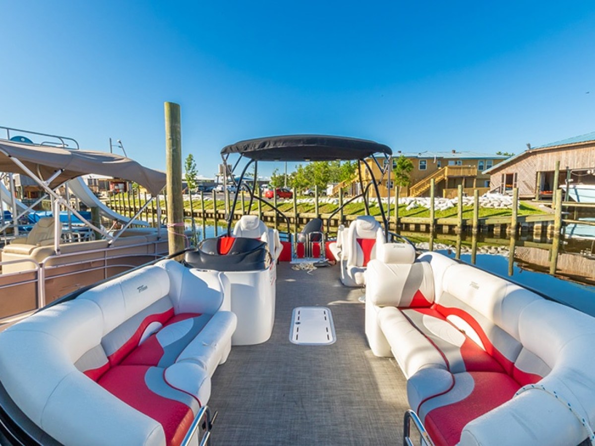 a boat sitting on top of a bed