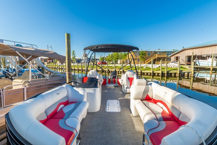 a boat sitting on top of a bed