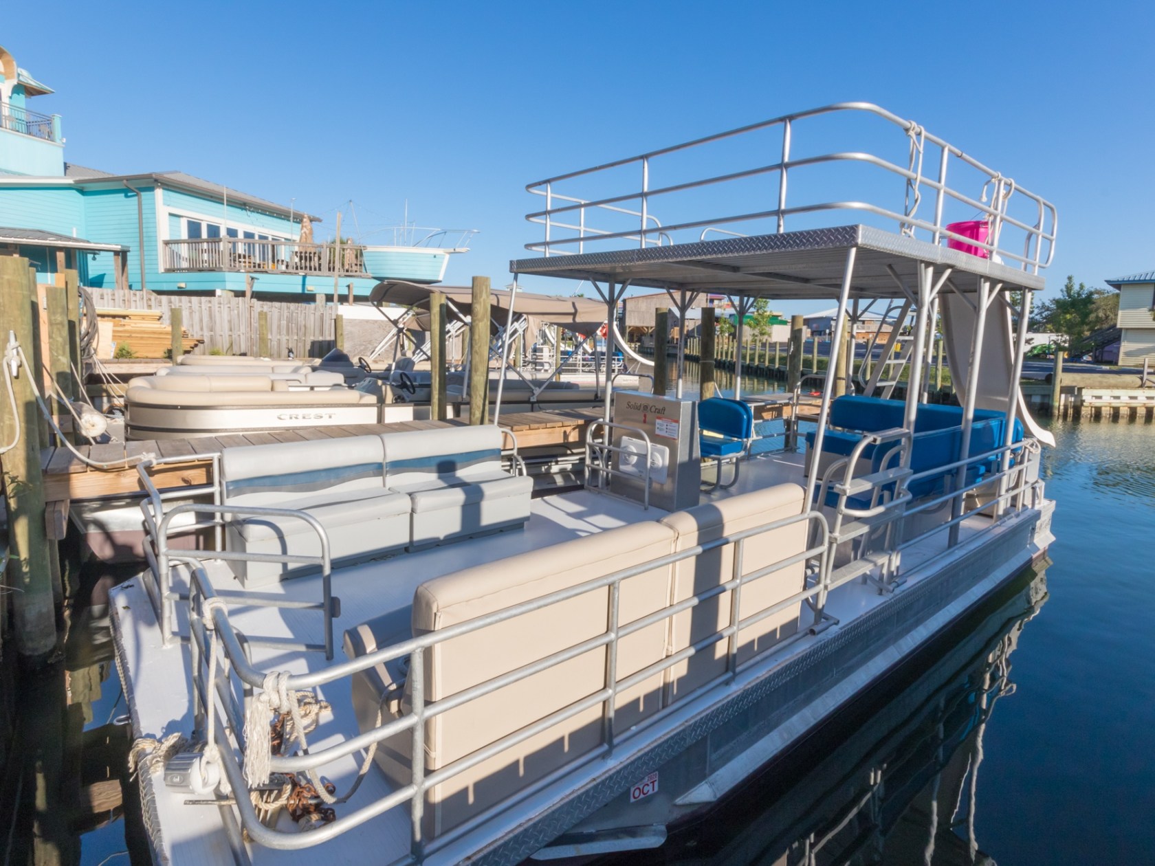 a boat is docked next to a body of water
