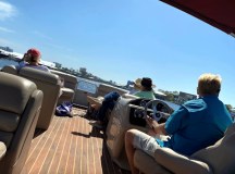 a group of people sitting around a plane