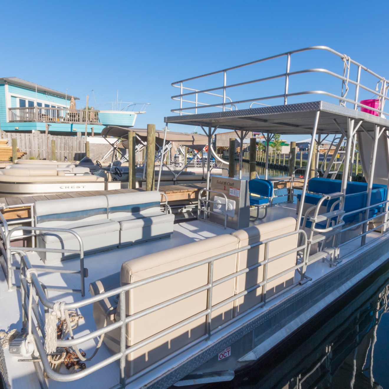a boat is docked next to a body of water