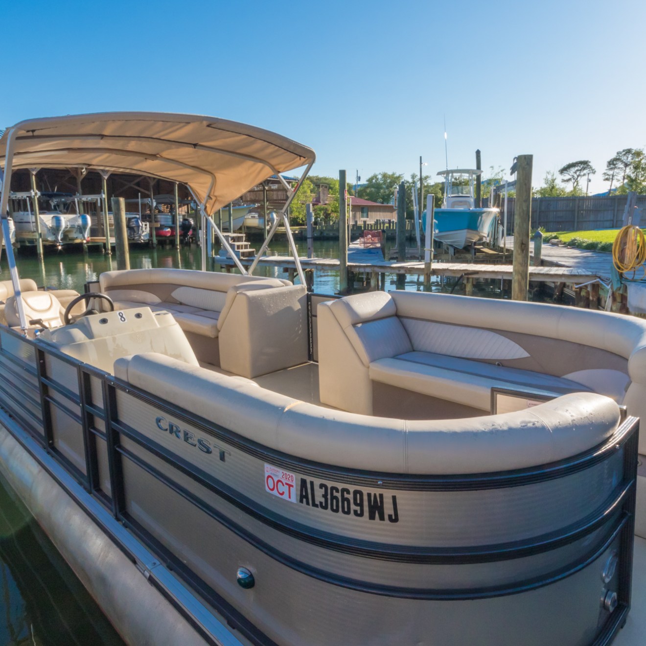 a boat is docked next to a body of water